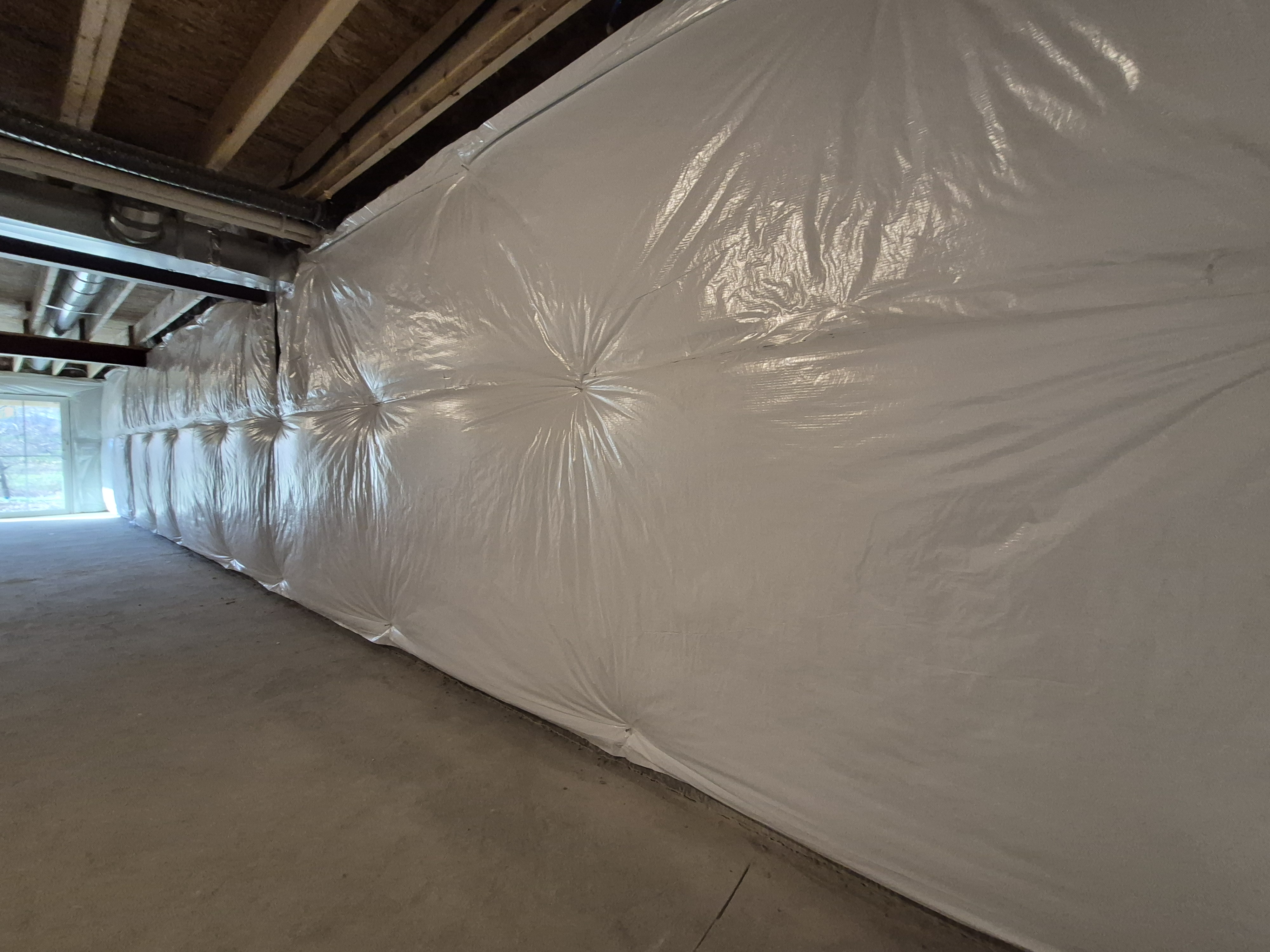 Basement blanket insulation installed on foundation walls