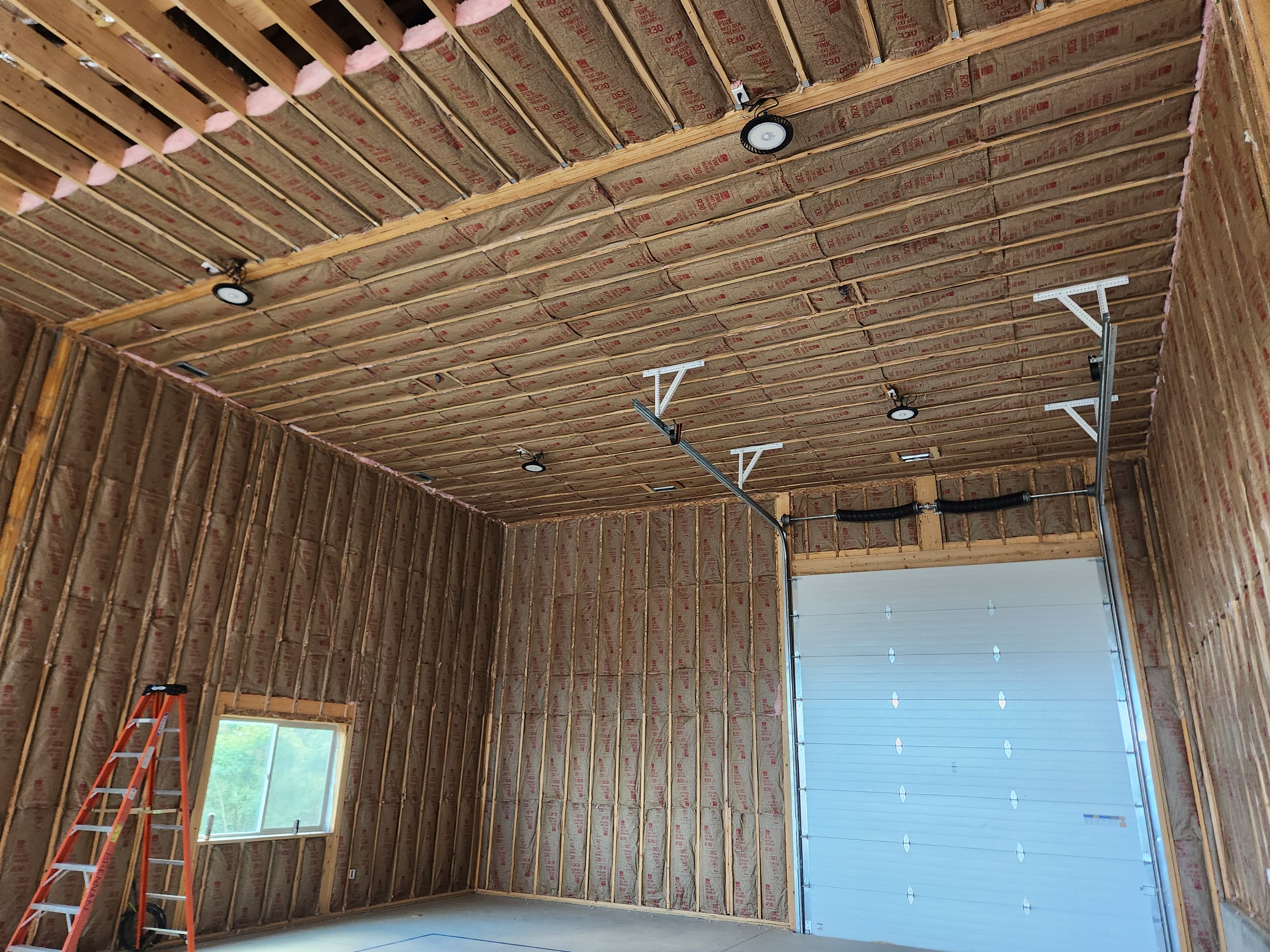 Batt fiberglass insulation in garage ceiling